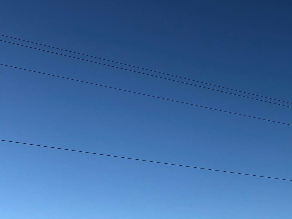 blue sky with powerlines